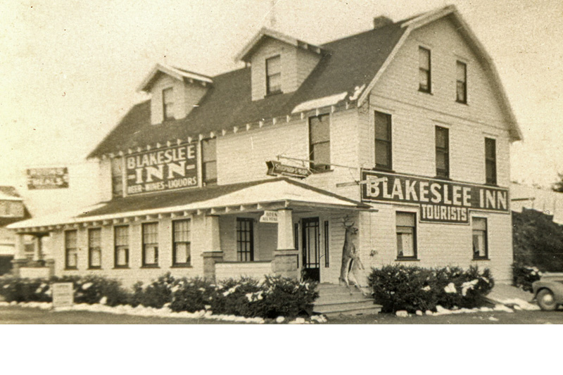 Blakeslee Inn during buck season, with a trophy hanging on the front porch.