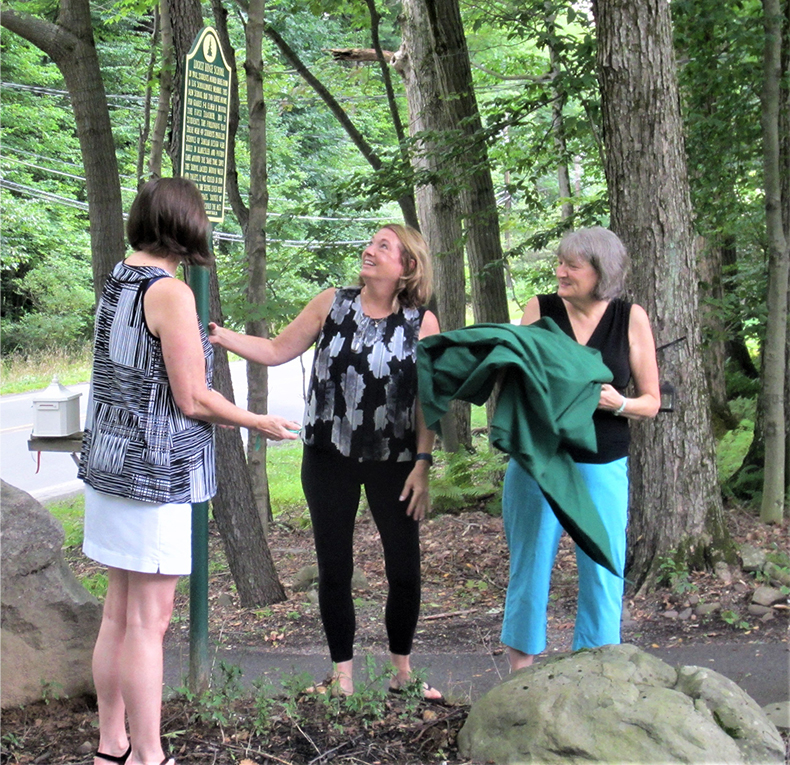 The Selig sisters unveil the Locust Ridge School historical marker.